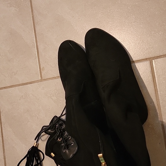 Knee-length boots with gold heel accent, side zipper, and adjustable back laces. - Picture 6 of 14